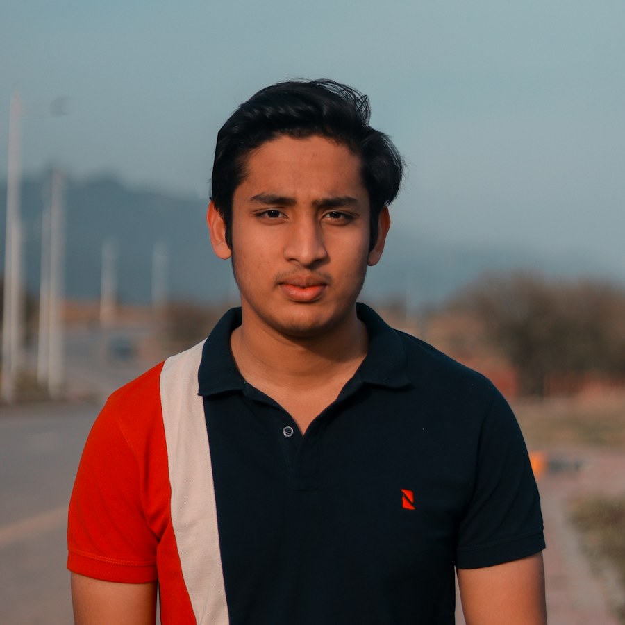 Man wearing a black polo shirt